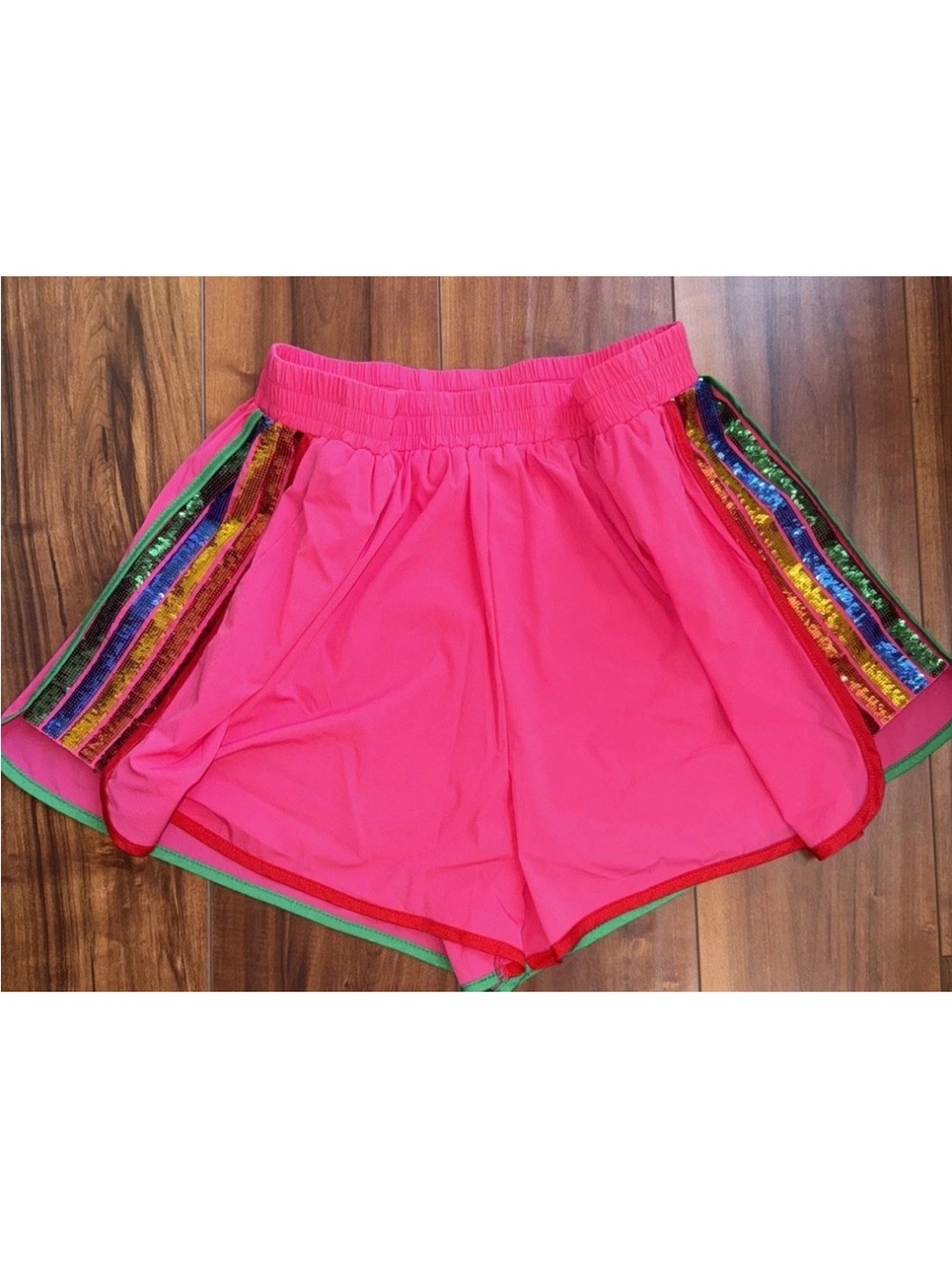 Queen of Sparkles Neon Pink Athletic Shorts with Rainbow Sequin Side Stripes